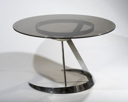 null Boris TABACOFF (1927-1985).

Living room table with a circular smoked glass...