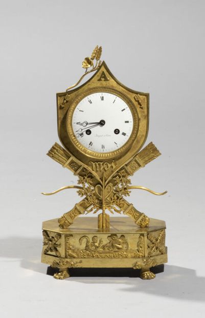  Gilt bronze clock in the form of a shield, with the inscription: "A Moi". 
The movement...