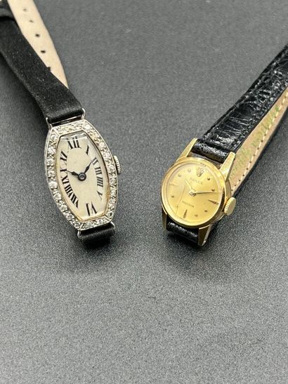  ROLEX. 
Small lady's WATCH in yellow gold 750 mm, the round dial, bracelet and pin...