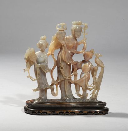 CHINA.

Carved agate group representing a...