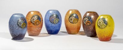 null André DELATTE (1887-1953).

Suite of six ovoid vases out of doubled glass with...