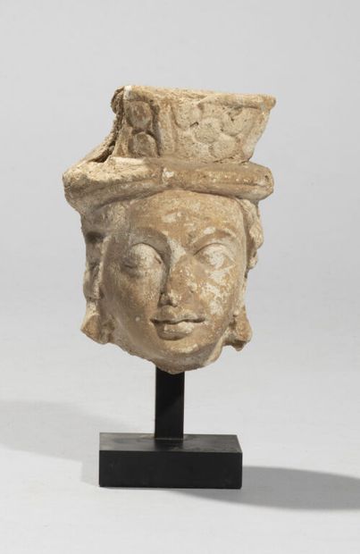 null Greco-Buddhist art of GANDHARA.

Small stucco head of a deity, wearing a crown,...