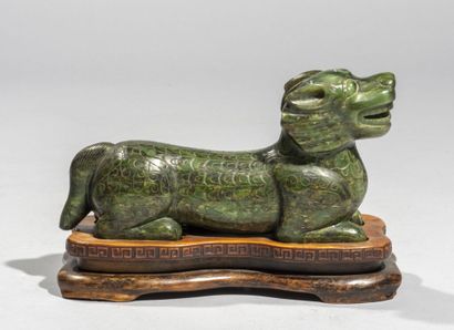 CHINA.

Fantastic animal in green stone with...