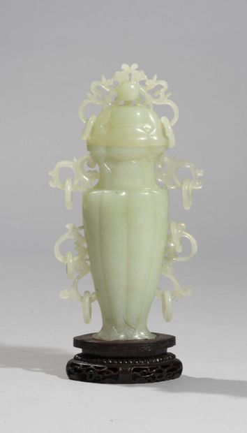CHINA.

Covered serpentine ribbed vase decorated...