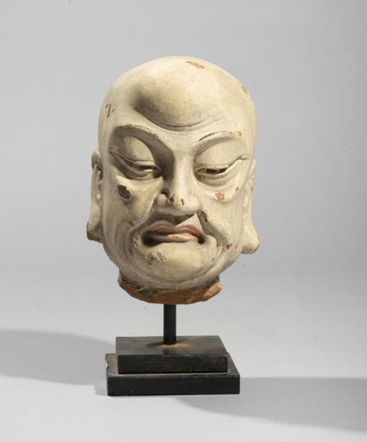 CHINA.

Head of luohan in polychrome stucco,...