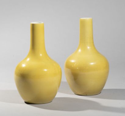 CHINA.

Pair of porcelain mallet vases with...