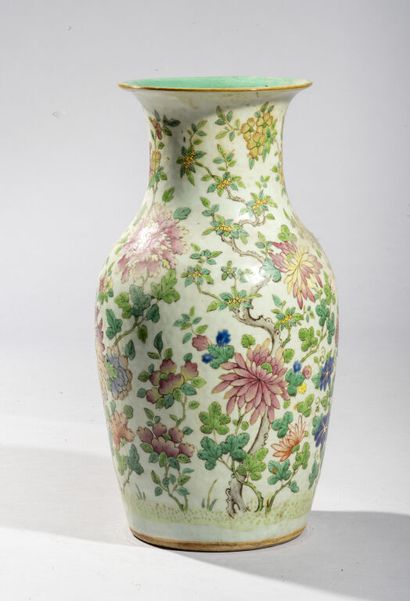 null CHINA (Canton).

Polychrome porcelain baluster vase decorated with flowering...