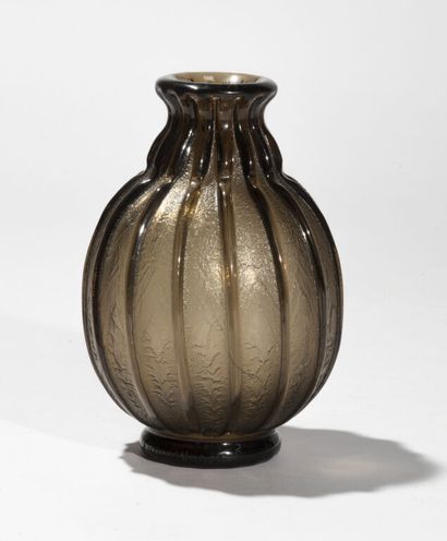 DAUM.

Smoked glass baluster vase with frosted...