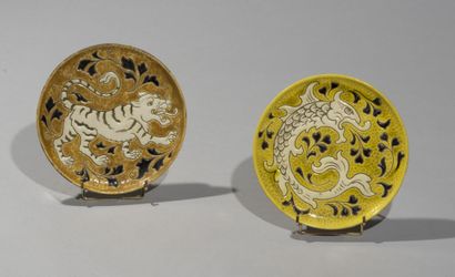 null Raoul LACHENAL (1885-1956).

Pair of circular ceramic plates enamelled with...