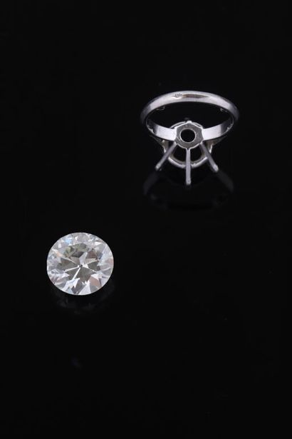 null RING in 750 mm white gold, set with a half-cut diamond weighing 6.84 cts, M...