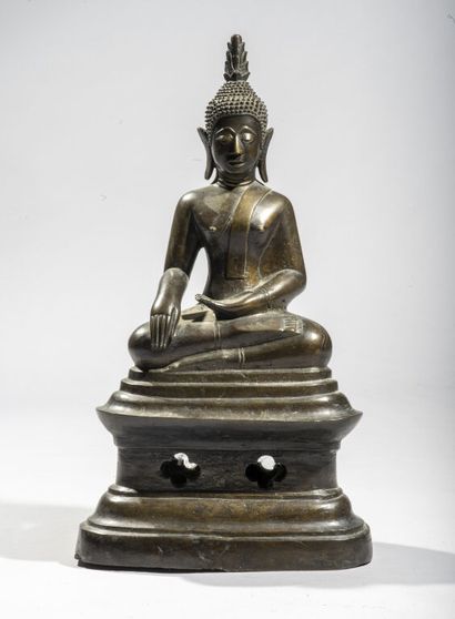 null BURMA.

Statue of Buddha in bronze, represented seated in padmasana on a stepped...