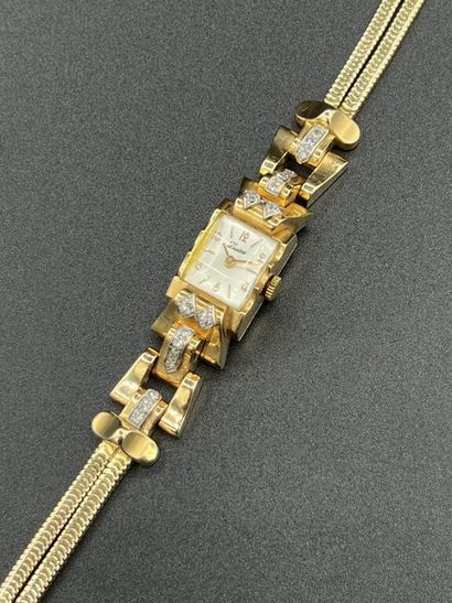 null LUXURY. Lady's bracelet-watch in yellow gold 750 mm and platinum said tank the...