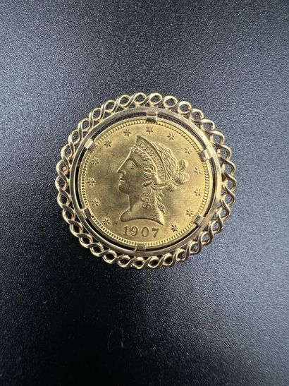 Pièce de 10 DOLLARS AMERICAINS en or, 1907, dans une monture de broche en or jaune...