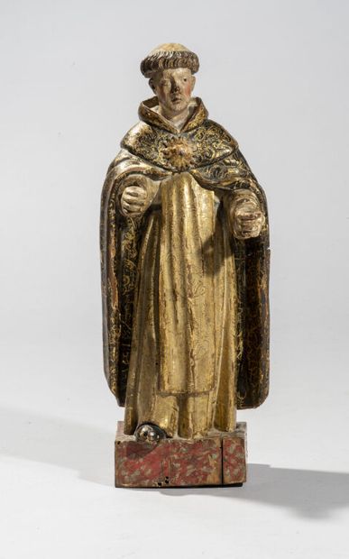 null Polychromed and gilded wood sculpture probably representing a bishop standing...
