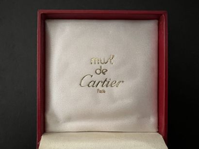 null MUST de Cartier. COUPE-CIGARE en or et acier, signé et numéroté, motif trin...