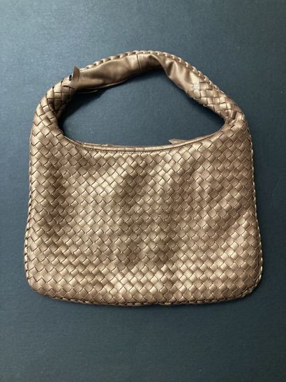 BOTTEGA VENETA 
Small half-moon bag in braided...