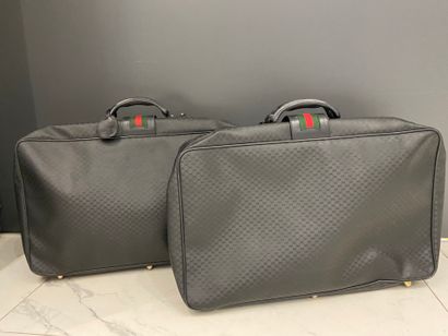 GUCCI 
Ensemble de deux grandes valises souples...