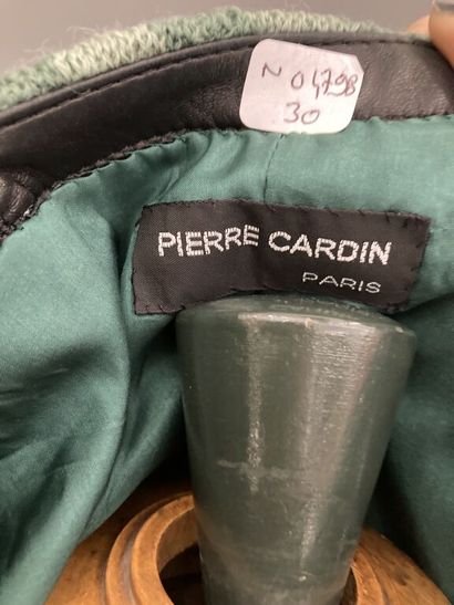  PIERRE CARDIN, circa 1970 
Sleeveless tunic in wool blend and moss green acrylic...