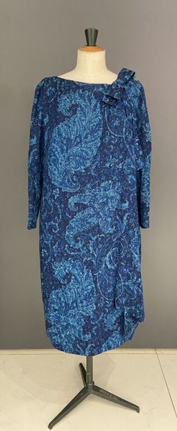  PIERRE CARDIN 
Blue silk cameo dress printed with flowers and botehs on a grid effect...