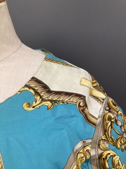  HERMES Paris Exclusif - HERMES Sport 
Long dress in turquoise, gold and brown silk...