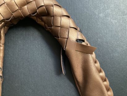 null BOTTEGA VENETA

Small half-moon bag in braided golden leather, zipper, short...