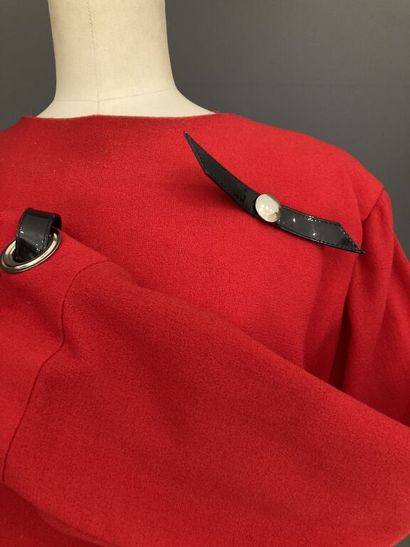  PIERRE CARDIN 
Red wool blend crepe dress, round neckline, the cuffs of the long...