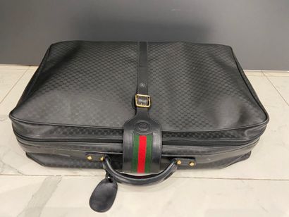 GUCCI 
N°010.123.369065 
Small suitcase in...