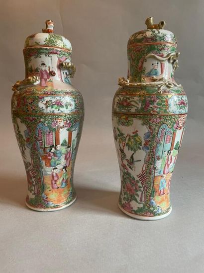 CHINA CANTON 
Pair of covered porcelain vases...