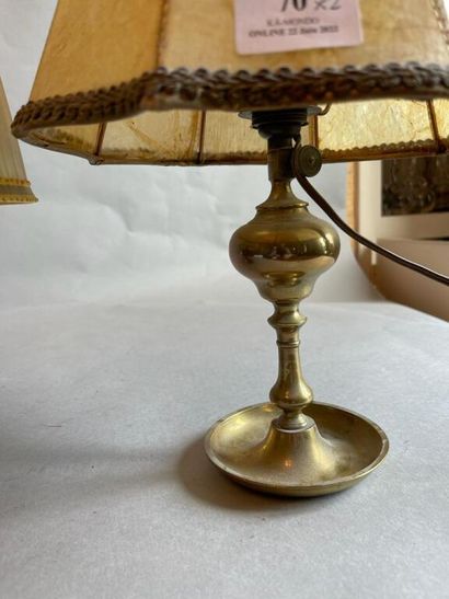 null Pewter candlestick mounted in lamp.

We joined a brass lamp.