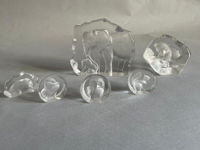 MATT JONASSON 
Set of six pressed glass paperweights...
