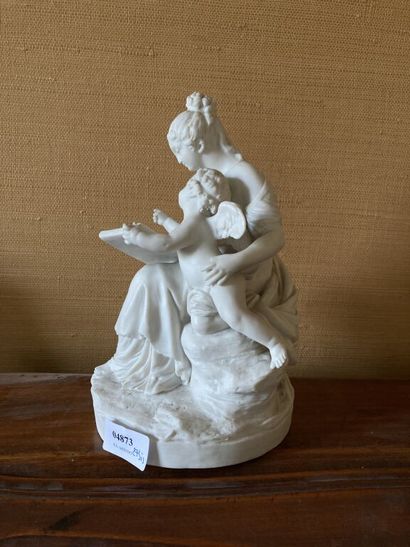 null Porcelain cookie group representing a woman and an angel. 

H. 24 cm.