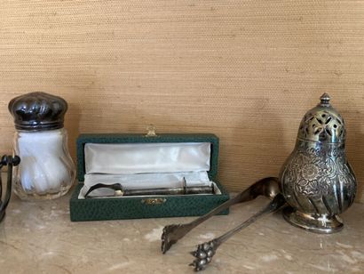 null A metal or silver plated pewter lot including salt and pepper shakers, blue...