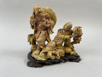 null CHINE, XXe siècle

Groupe sculpté en pierre dure figurant des pêcheurs.

H....