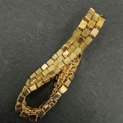 null MAUBOUSSIN - Georges LENFANT. About 1970. 

BRACELET in yellow gold 750 mm composed...