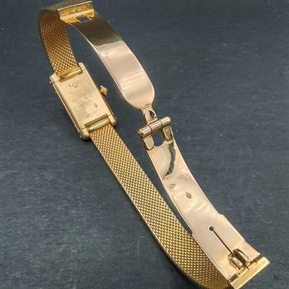 null CARTIER. Mini-Tank model. 

Lady's bracelet-watch in yellow gold 750 mm, the...