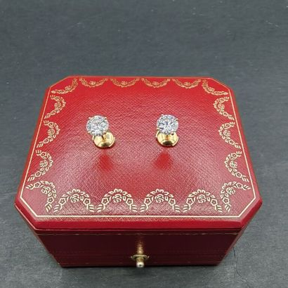 null CARTIER. About 1990. 

Pair of 750 mm yellow gold EARRINGS, each set with a...