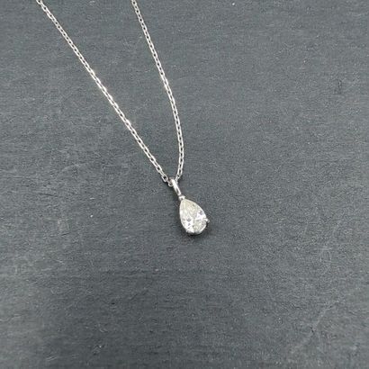 null White gold pendant and chain 750 mm holding a pear-shaped diamond weighing approximately...