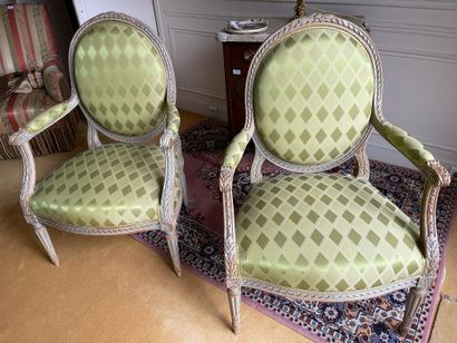 Pair of medallion armchairs in carved wood...