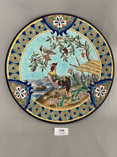 null Enamels of LONGWY.

Circular dish in earthenware of Longwy polychrome with decoration...