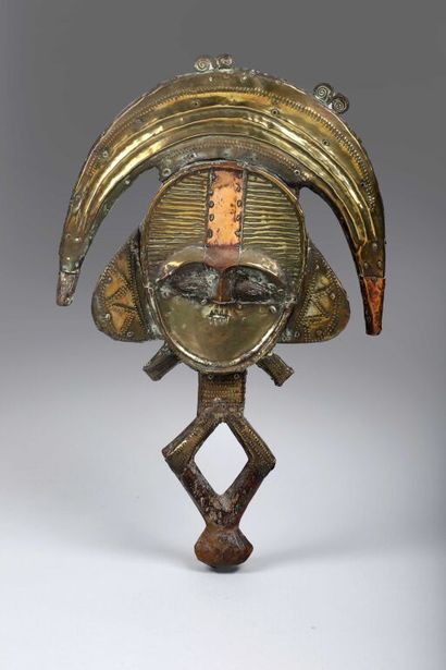 Wooden reliquary figure representing a stylized...