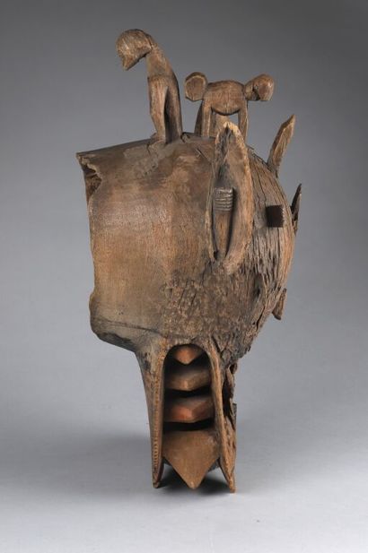 null Fire-breathing helmet mask with a muzzle showing stylized teeth. Small horns...