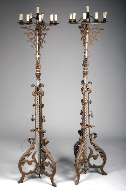 null Pair of torchères with ten arms of light, the twisted shaft in silver plated...