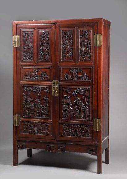 CHINA.
Cabinet in exotic wood opening by...