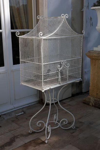 Birdcage in white lacquered iron in the shape...