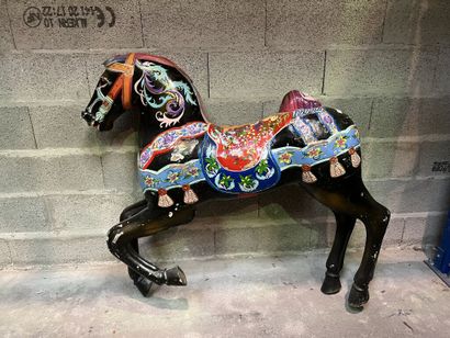 Carved wood horse with polychrome and gilded...