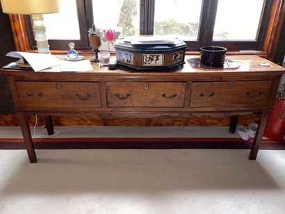 Large waxed walnut sideboard opening with...
