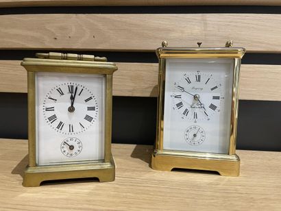 Two brass officer's clocks, one signed Looping,...