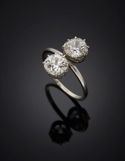 null RING said toi et moi in 950 mm platinum set with two old cut diamonds weighing...