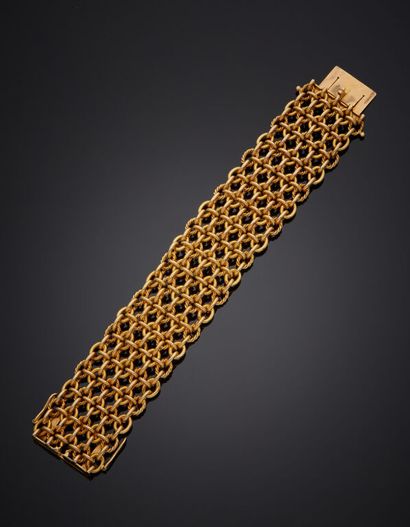 BRACELET in yellow gold 750 mm with fabric...