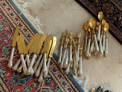 null Silver-plated and gilded metal service set comprising 12 large flatware pieces...